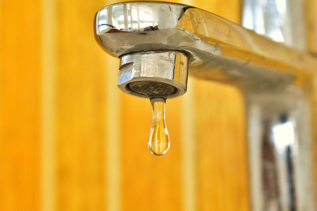 dripping leaky bathtub faucet